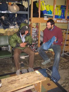 Jaime explains the winter booties to a student.