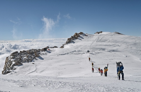 Expedition Denali team hiking toward summit-photo by Hudson Henry Expedition Denali team hiking toward summit-photo by Hudson Henry