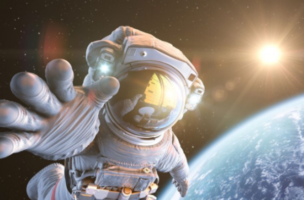 NASA astronaut in space, earth and sun in background
