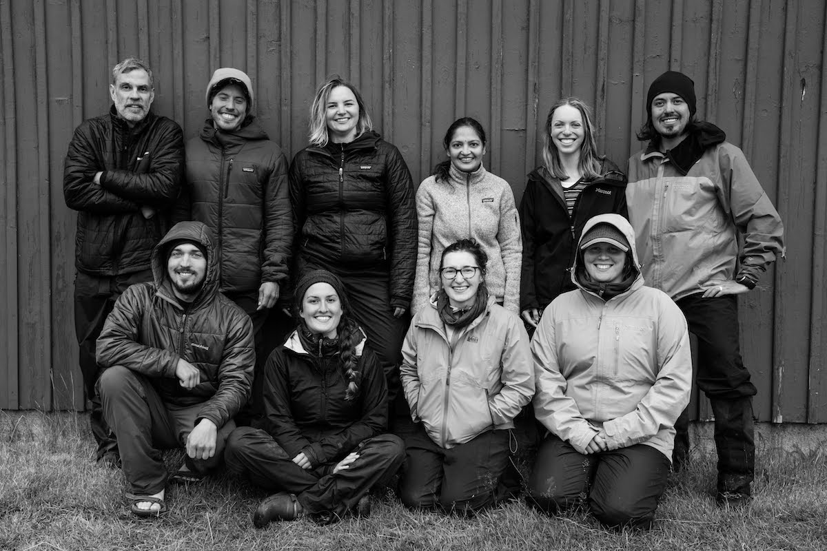 Black and white image of group of smiling people