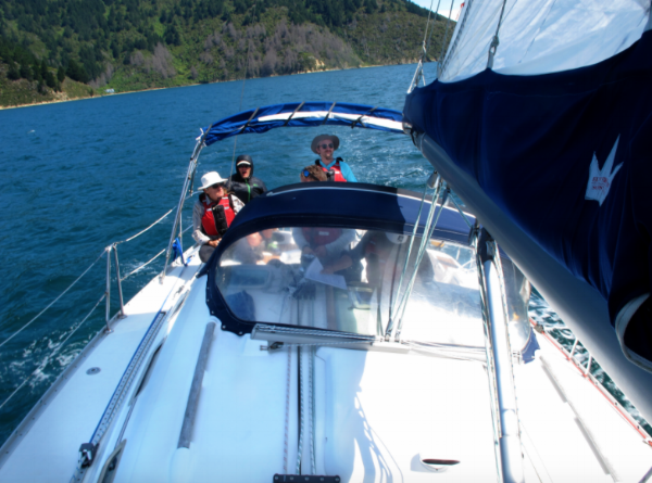 three NOLS students sailing on a New Zealand prime course-photo by David Brown three NOLS students sailing on a New Zealand prime course-photo by David Brown