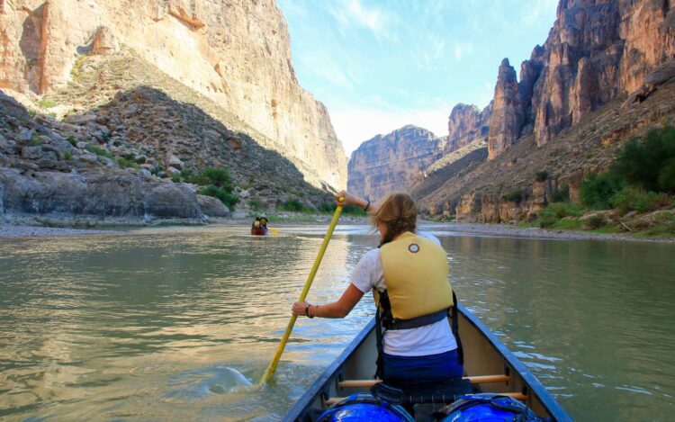 Students paddling down the Rio Grande as part of a two week canoe expedition.