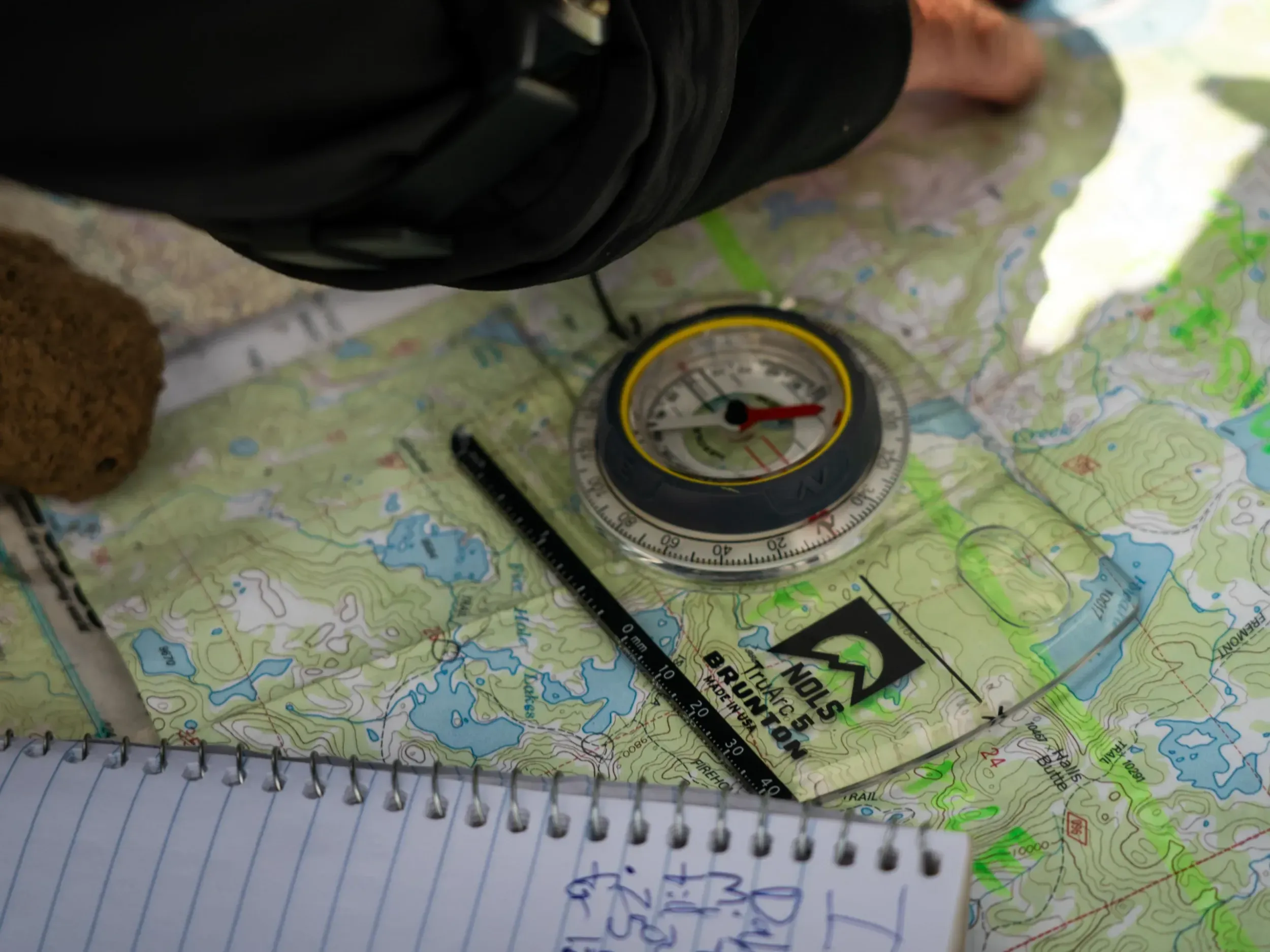 a compass sits on a map